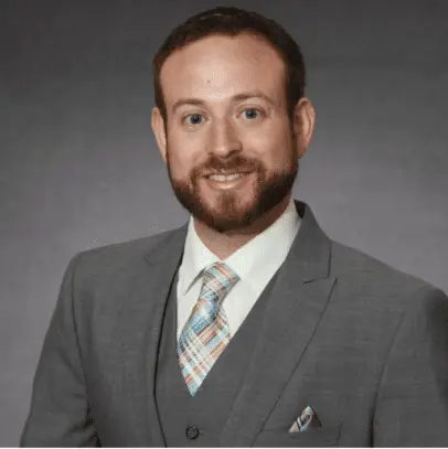 Dr. Jason Hawkins, a holistic physician at Azoth Health in Farmington Hills, Michigan, specializing in IV therapy, ketamine therapy, medical weight loss, osteopathic manipulative medicine, mental health medication management, and therapeutic injections.